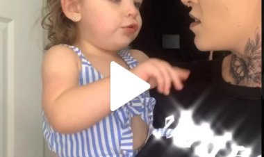 Yashyize amafoto hanze  yishimira umwana yabyaranye na se